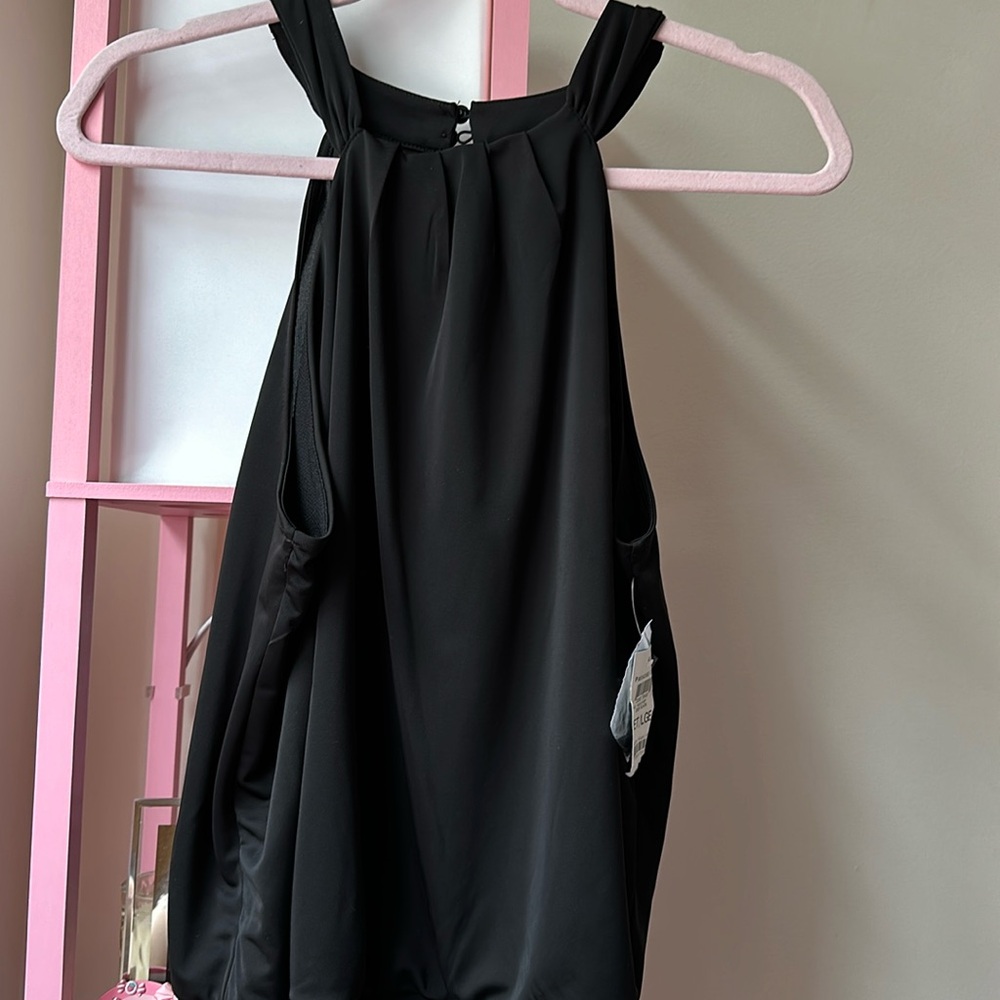Black sleeveless blouse